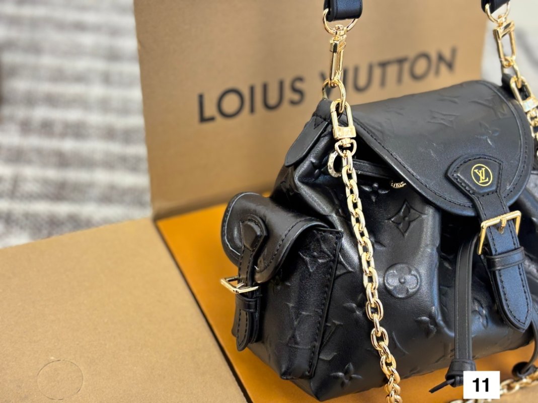 Louis Vuitton Odyssee Black Leather Embossed Shoulder Bag view