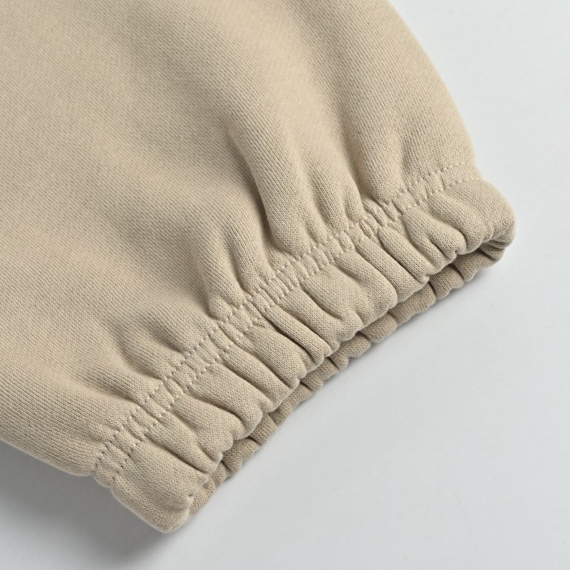 Essentials Fear of God Cream Joggers view