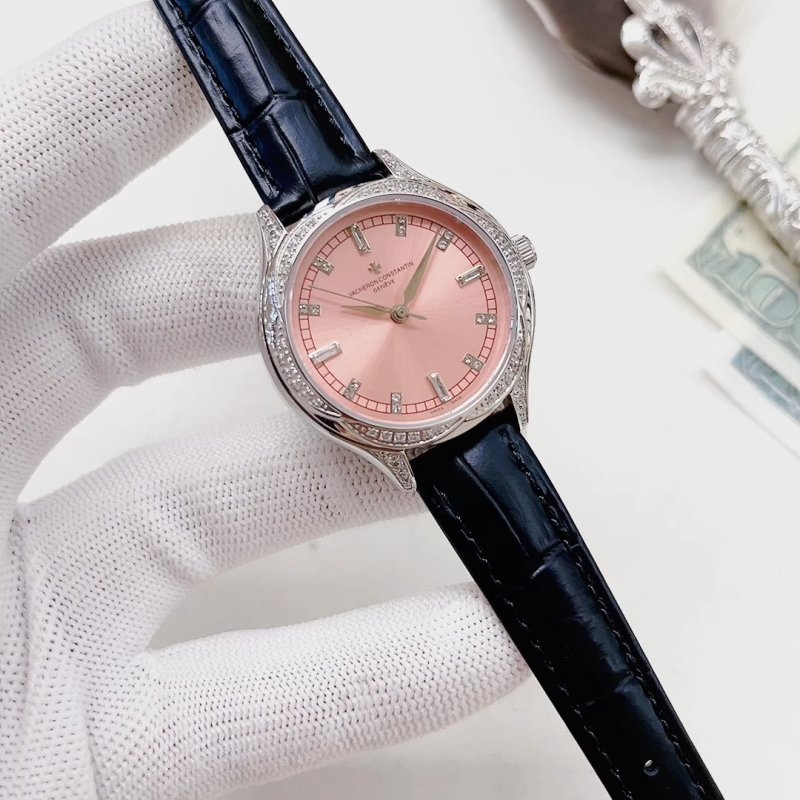 Rolex Oyster Perpetual Pink Dial Diamond Bezel Watch