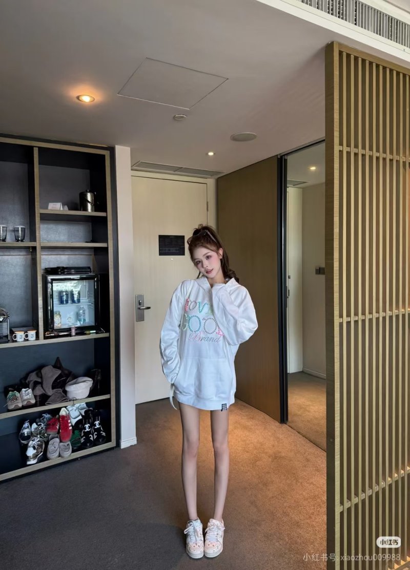 White Graphic Print Oversized Hoodie with Colorful Text Design