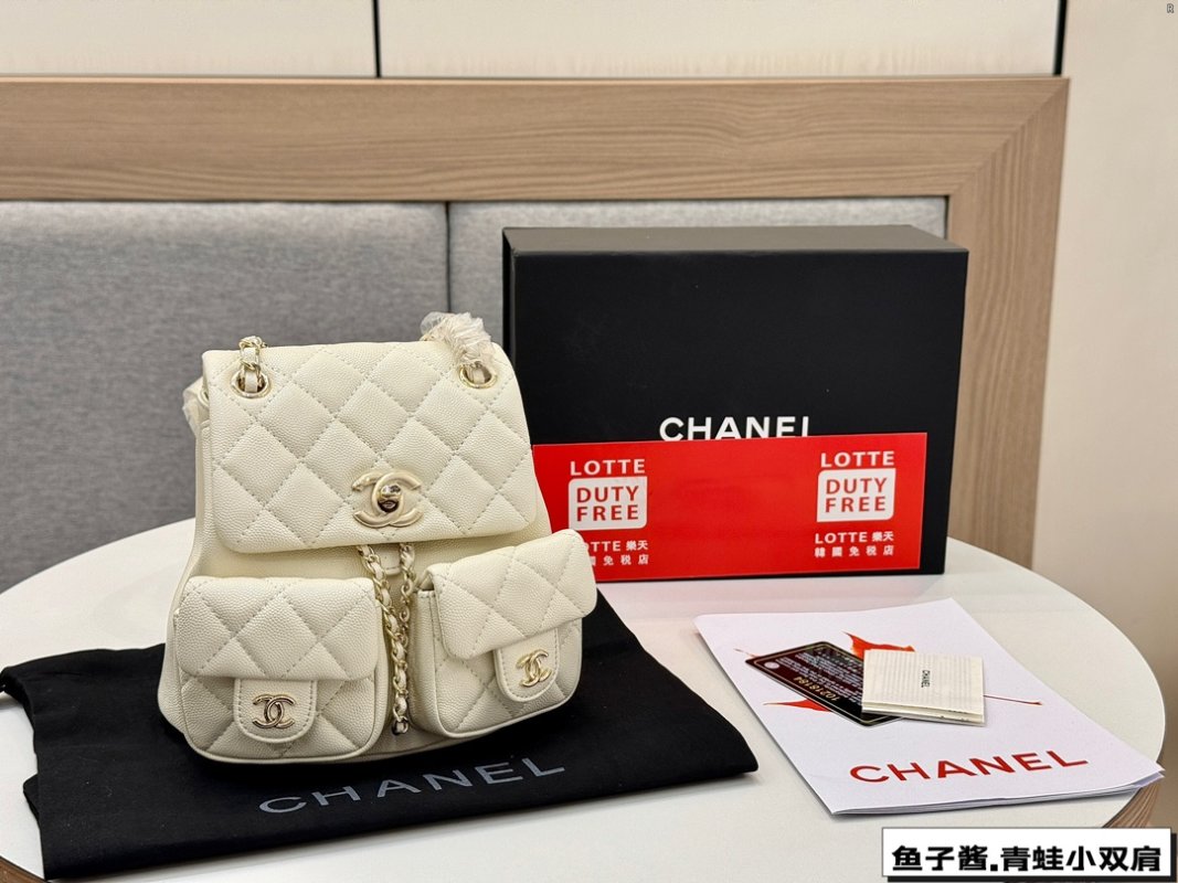 Chanel Caviar Quilted Frog Dual Pocket Backpack - Cream