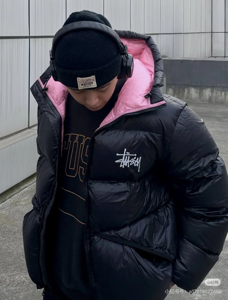 Stüssy Black Puffer Jacket with Pink Hood Lining view