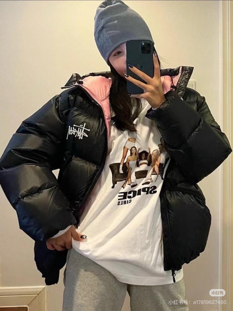 Stüssy Black Puffer Jacket with Pink Hood Lining view