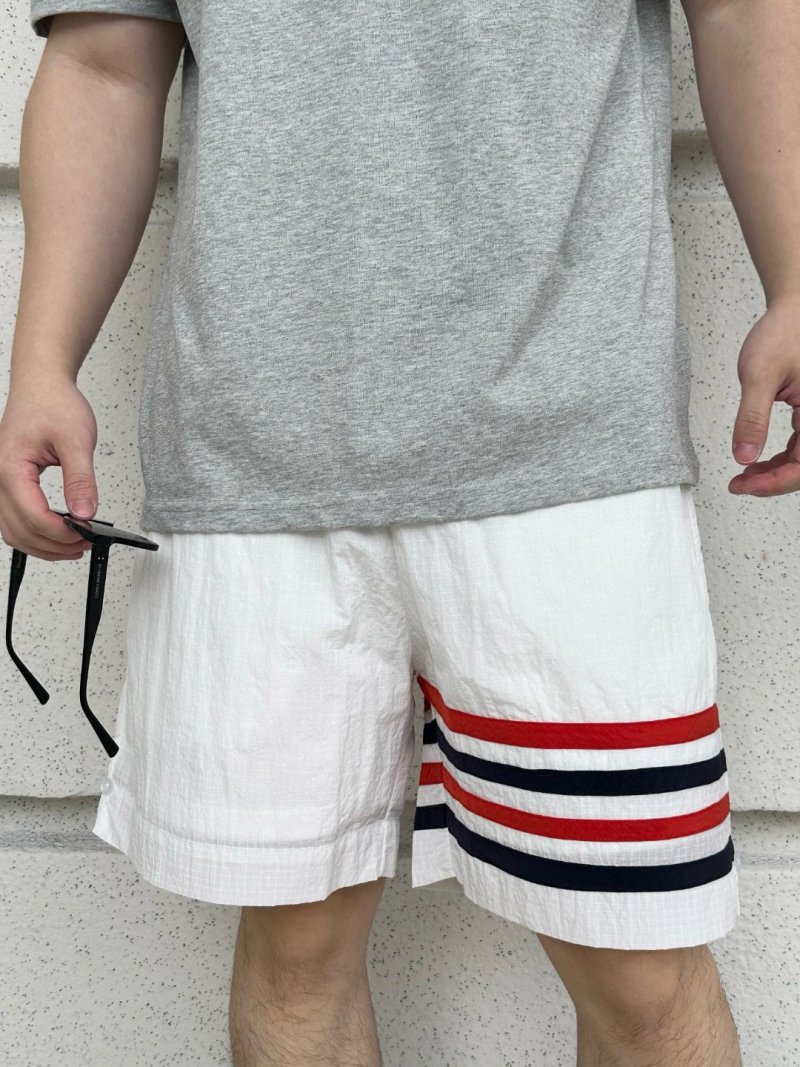 White Shorts with Red Navy Stripe Detail view