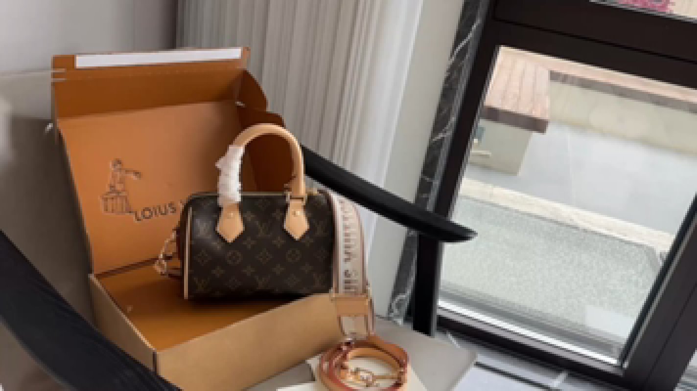 Louis Vuitton Speedy Monogram Canvas Handbag Brown