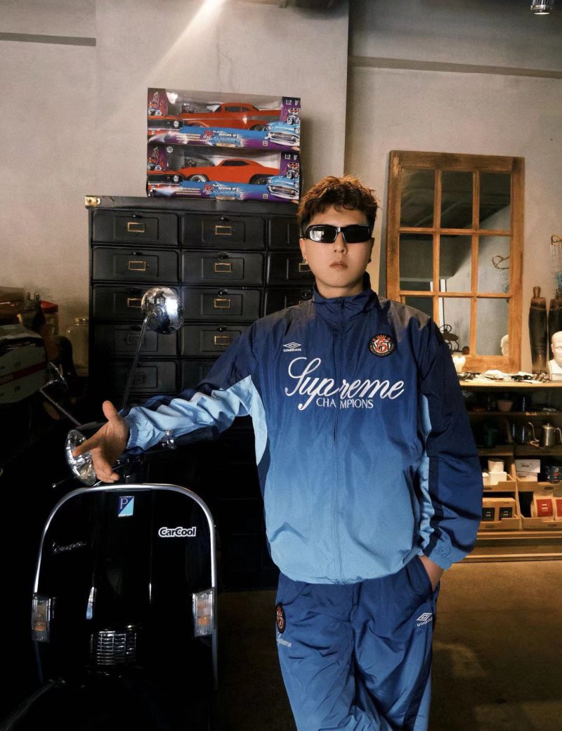 Supreme Champions Navy Track Pants