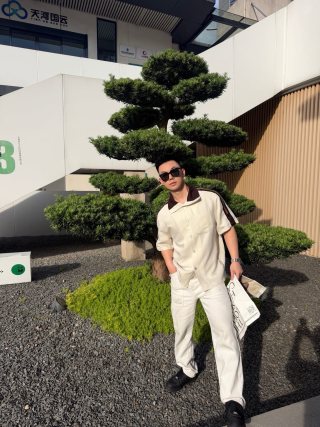 Louis Vuitton Cream Oversized Button-Up Shirt with Stripe Detail view 8