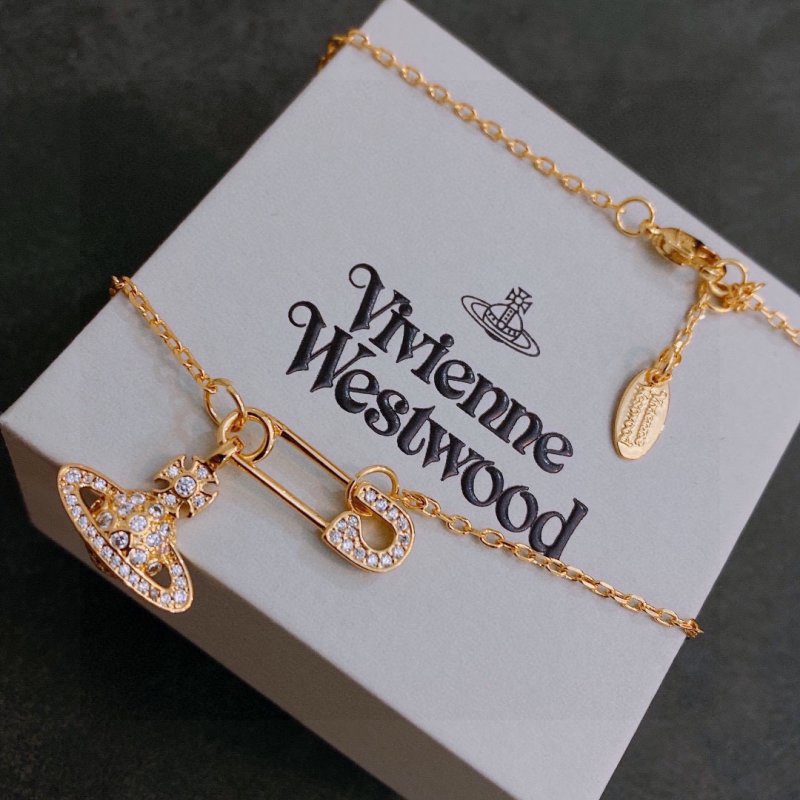 Vivienne Westwood Saturn Orb Safety Pin Gold Necklace view