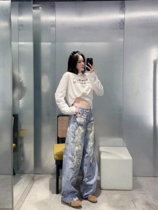 Light Blue Distressed Wide-Leg Jeans with Ripped Details