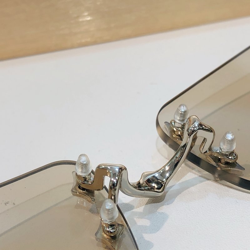 Gentle Monster BOLD Titanium Rimless Sunglasses - Clear view