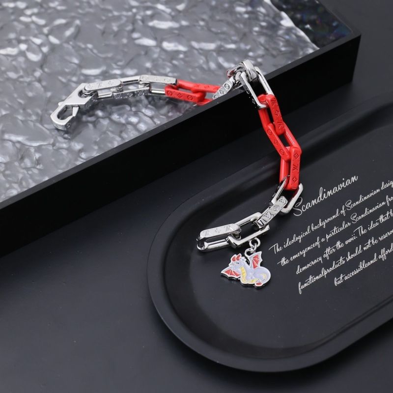 Louis Vuitton Metal Chain Link Red Resin Dragon Charm Bracelet view