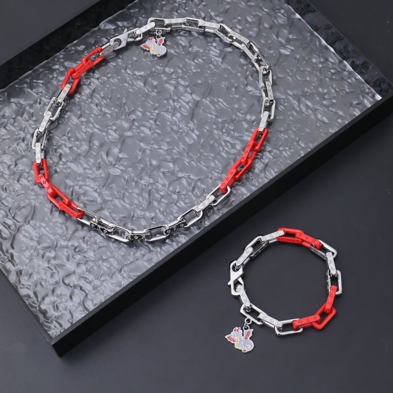 Louis Vuitton Metal Chain Link Red Resin Dragon Charm Bracelet view