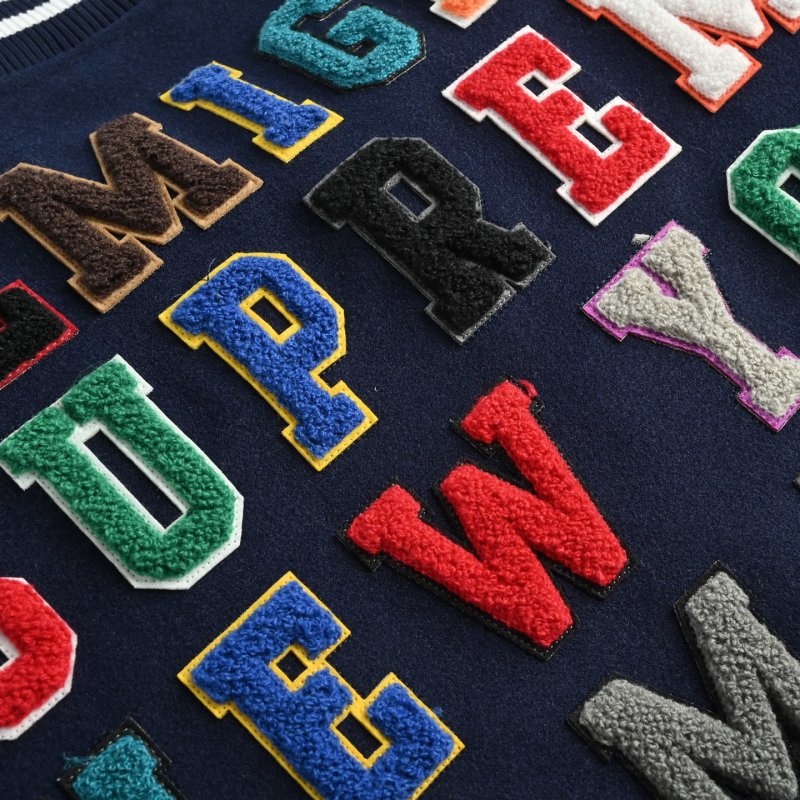 Navy & Cream Varsity Bomber Jacket with Colorful Embroidered Sleeves view
