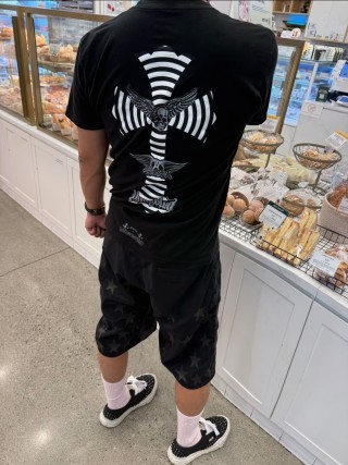 Black Graphic Skull Wings T-Shirt with Hypnotic Stripes