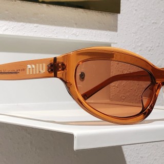 Miu Miu SMU 108Z Black Oval Sunglasses view 8