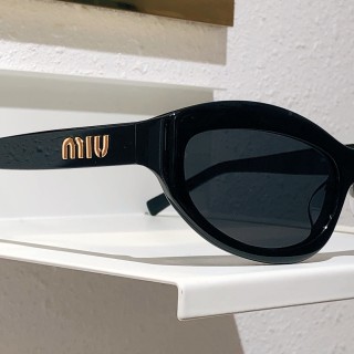 Miu Miu SMU 108Z Black Oval Sunglasses view 9