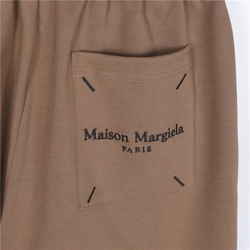 Essentials Tan Relaxed Fit Shorts with Logo Print view