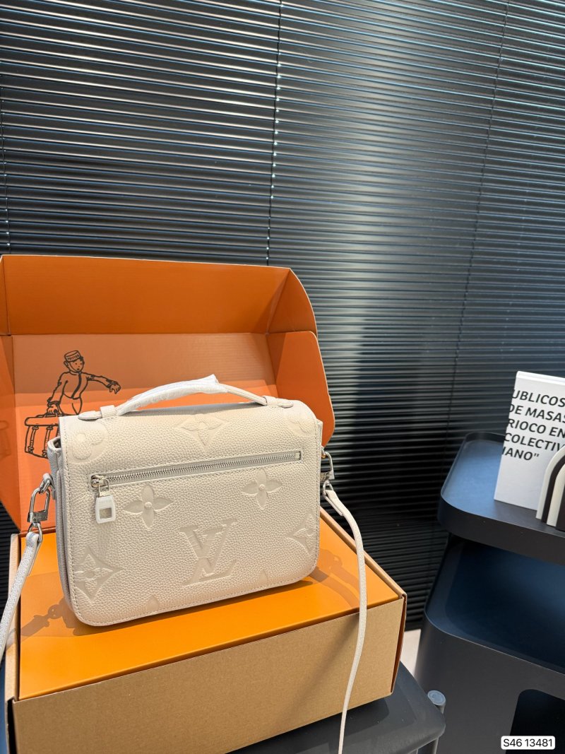 Louis Vuitton Cream Embossed Leather Messenger Bag view