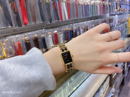 Chanel Gold & Black Leather Woven Band Watch