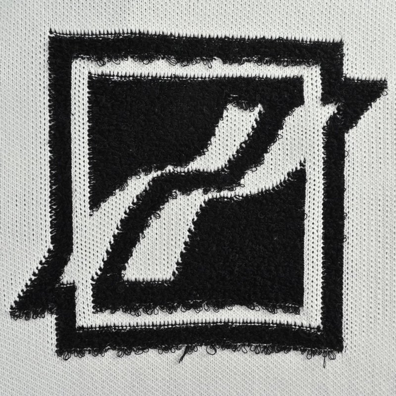 White Oversized Knit Sweater with Black Geometric Logo view