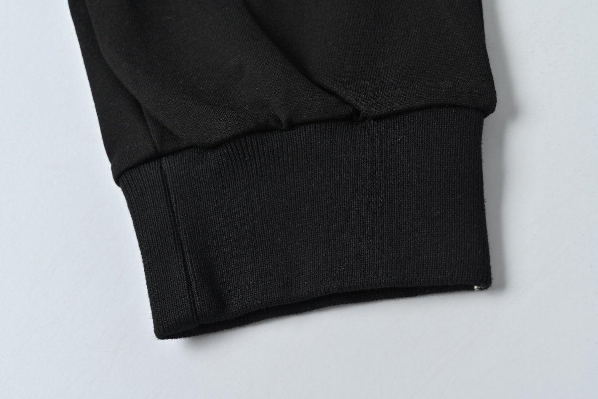 Prada Black Joggers with Metal Zip Detail view