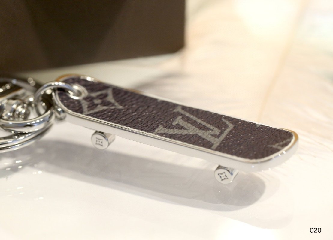 Louis Vuitton Monogram Skateboard Keychain Gold Hardware view
