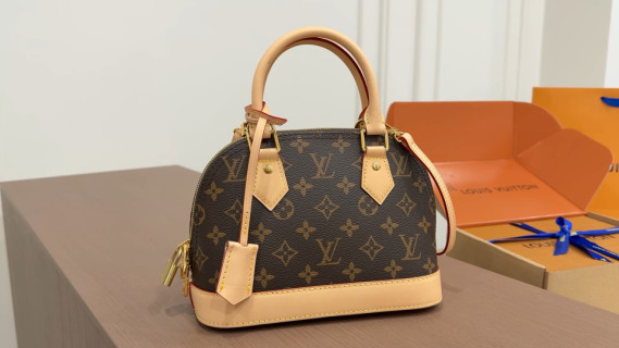 Louis Vuitton Monogram Alma PM Handbag Brown