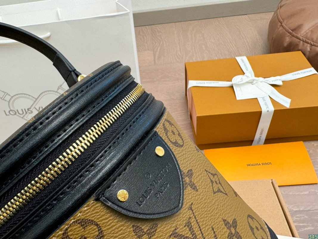 Louis Vuitton Monogram Canvas Cylinder Bucket Bag Black & Tan view