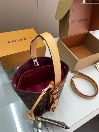 Louis Vuitton Monogram Bucket Bag - Tan Handle view 8