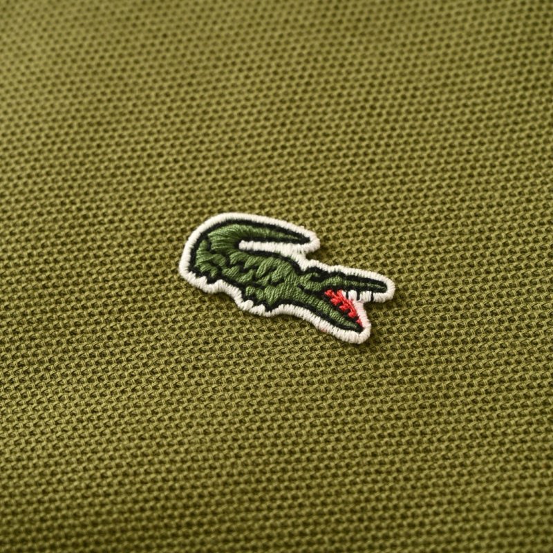 Lacoste Women's Olive Green Polo Shirt with Striped Trim view