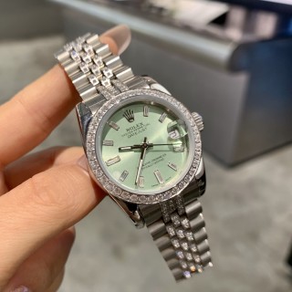 Rolex Datejust 31mm Diamond Bezel Mint Green Dial Steel Watch view 9