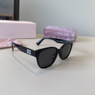 Miu Miu Black Round Sunglasses with Crystal Logo