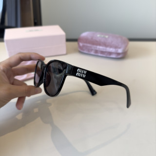 Miu Miu Black Round Sunglasses with Crystal Logo view 4