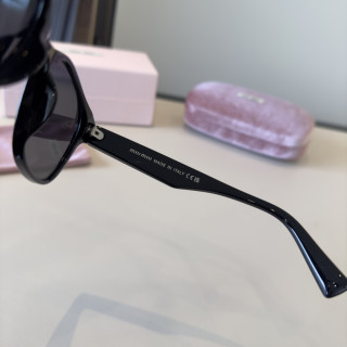 Miu Miu Black Round Sunglasses with Crystal Logo view 5
