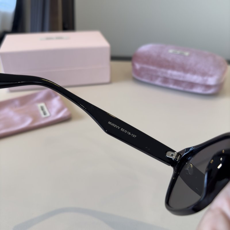 Miu Miu Black Round Sunglasses with Crystal Logo view