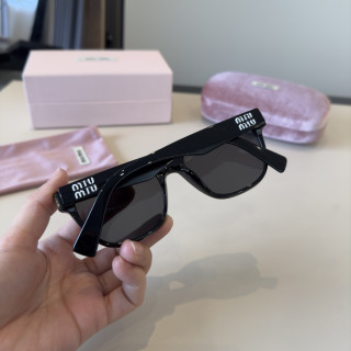 Miu Miu Black Round Sunglasses with Crystal Logo view 7