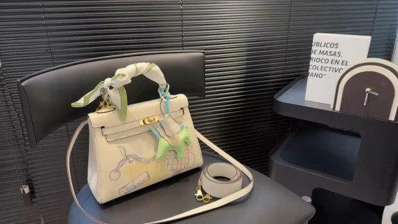 Hermès Kelly Bag Cream Leather with Green Silk Scarf