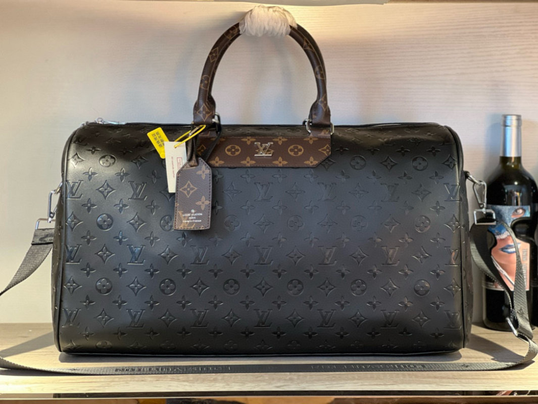Louis Vuitton Monogram Embossed Black Travel Duffel Bag