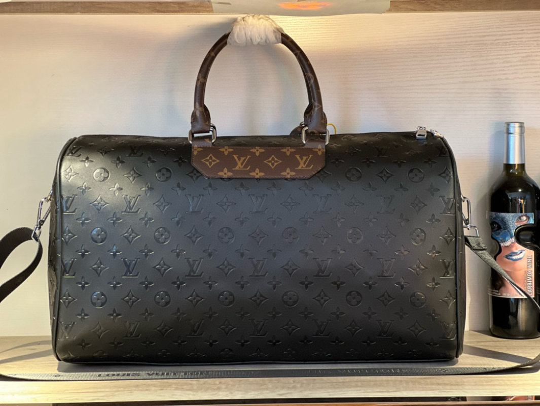 Louis Vuitton Monogram Embossed Black Travel Duffel Bag view