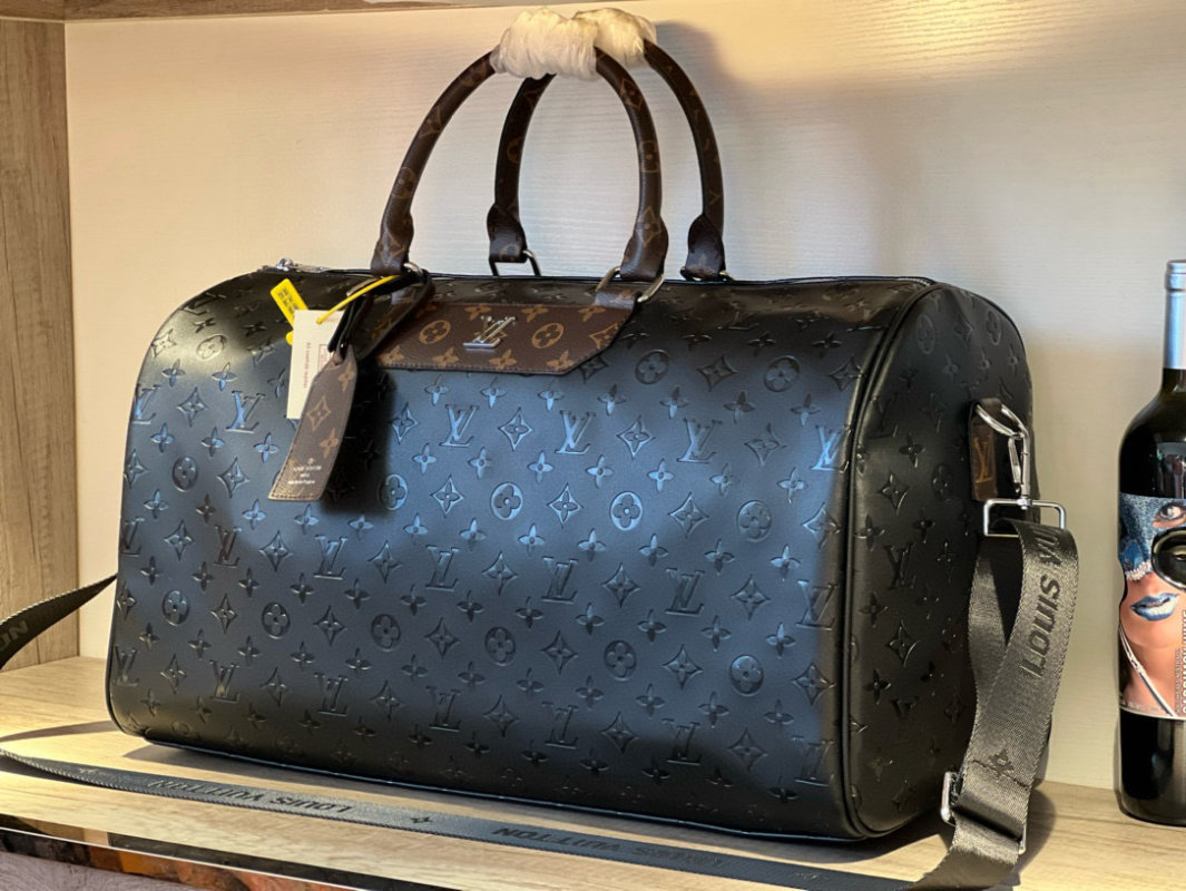 Louis Vuitton Monogram Embossed Black Travel Duffel Bag view
