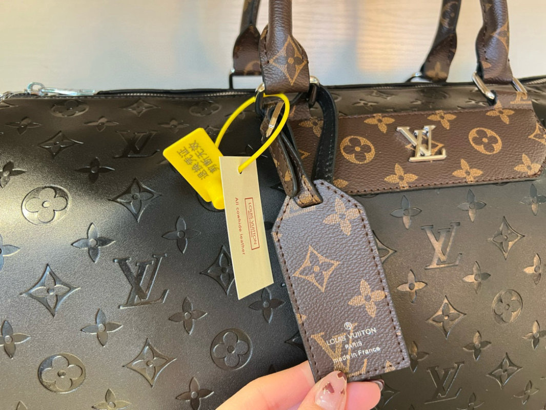 Louis Vuitton Monogram Embossed Black Travel Duffel Bag view
