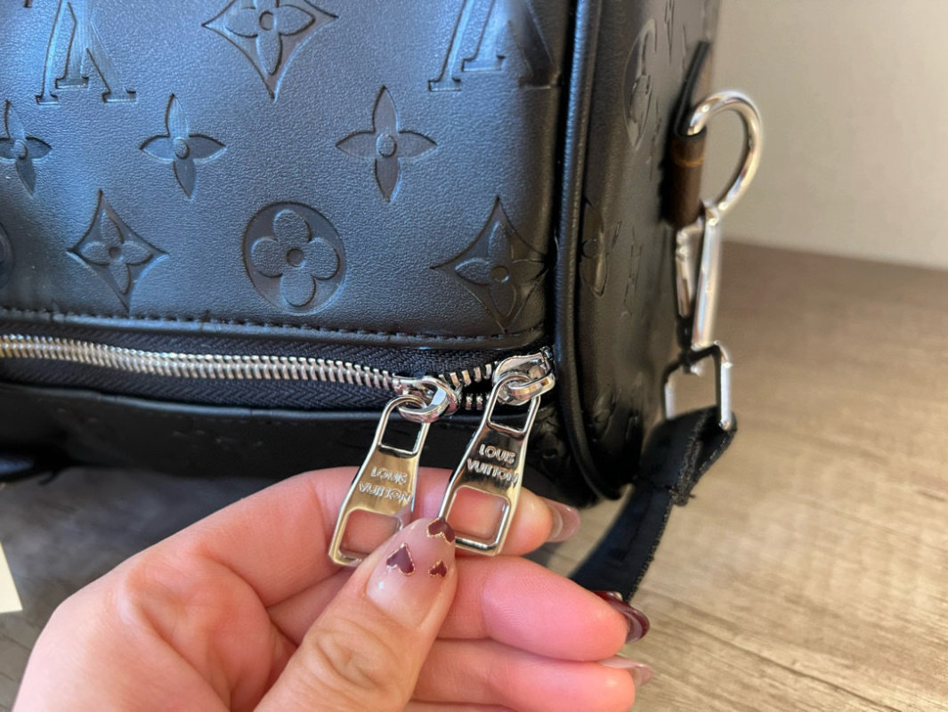 Louis Vuitton Monogram Embossed Black Travel Duffel Bag view