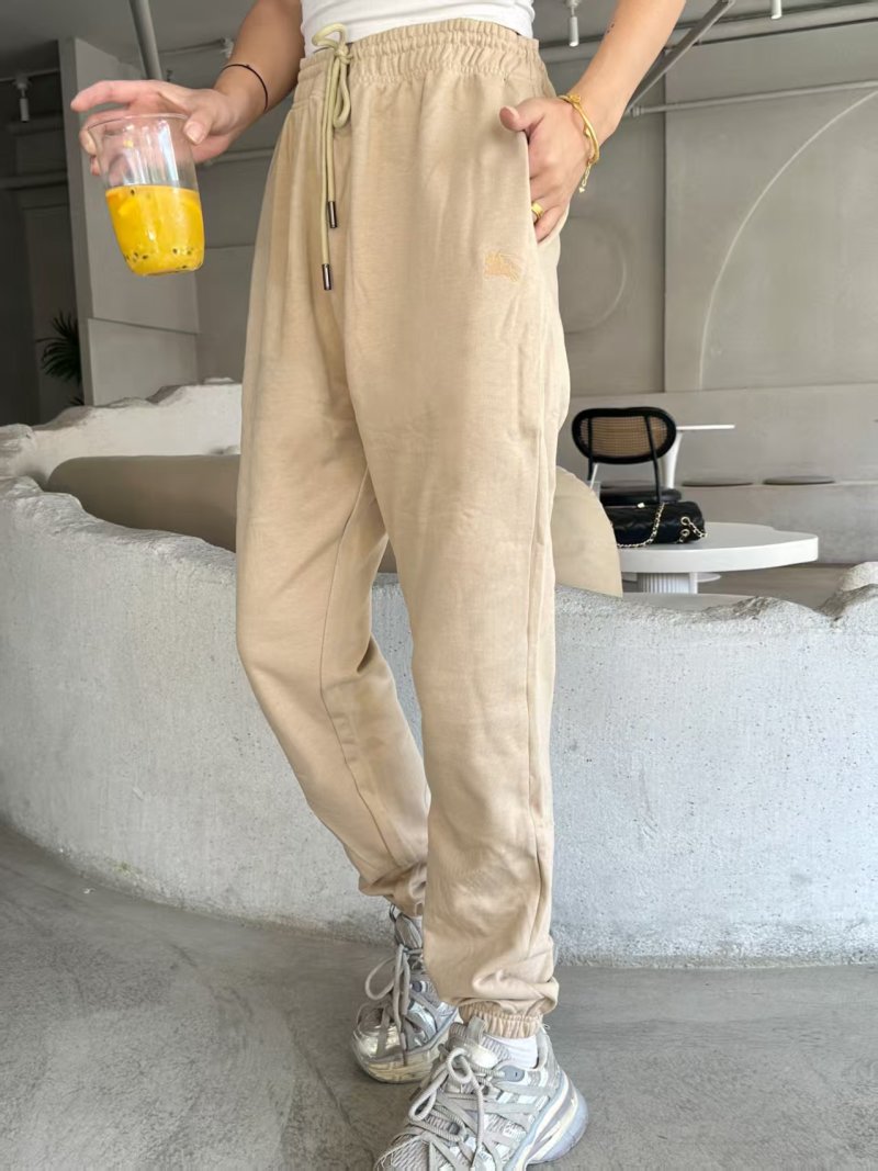 Beige Embroidered Jogger Pants with Crest Detail view