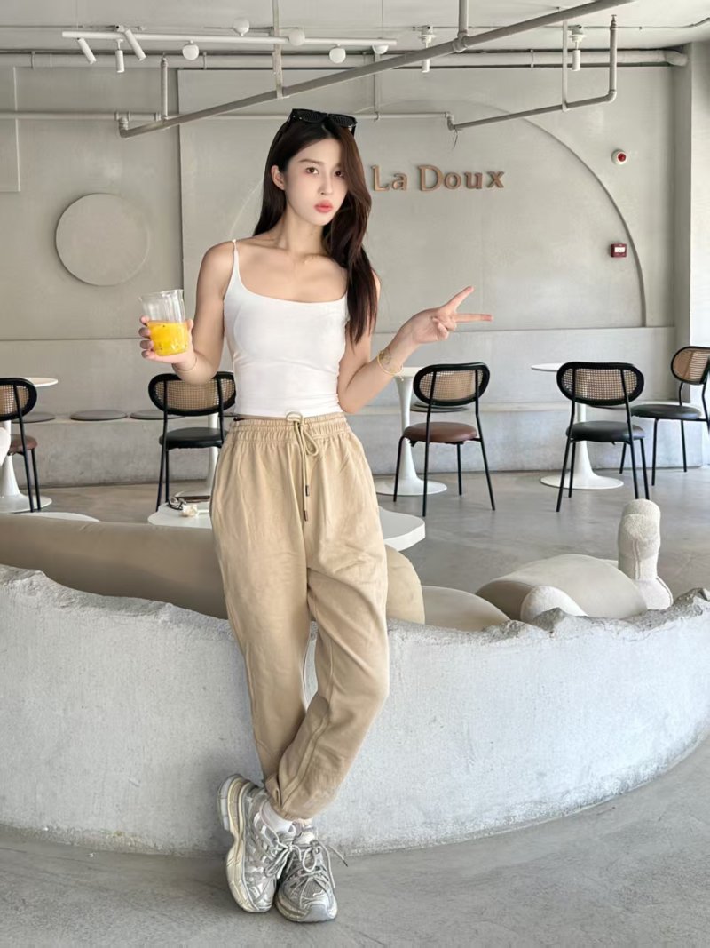 Beige Embroidered Jogger Pants with Crest Detail view
