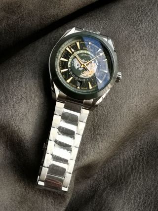 Omega Seamaster 220.30.43.22 Steel World Time Watch Green Dial view 2