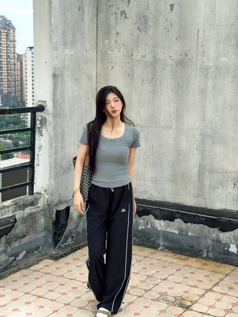 Alo Black Wide-Leg Track Pants with White Stripe view