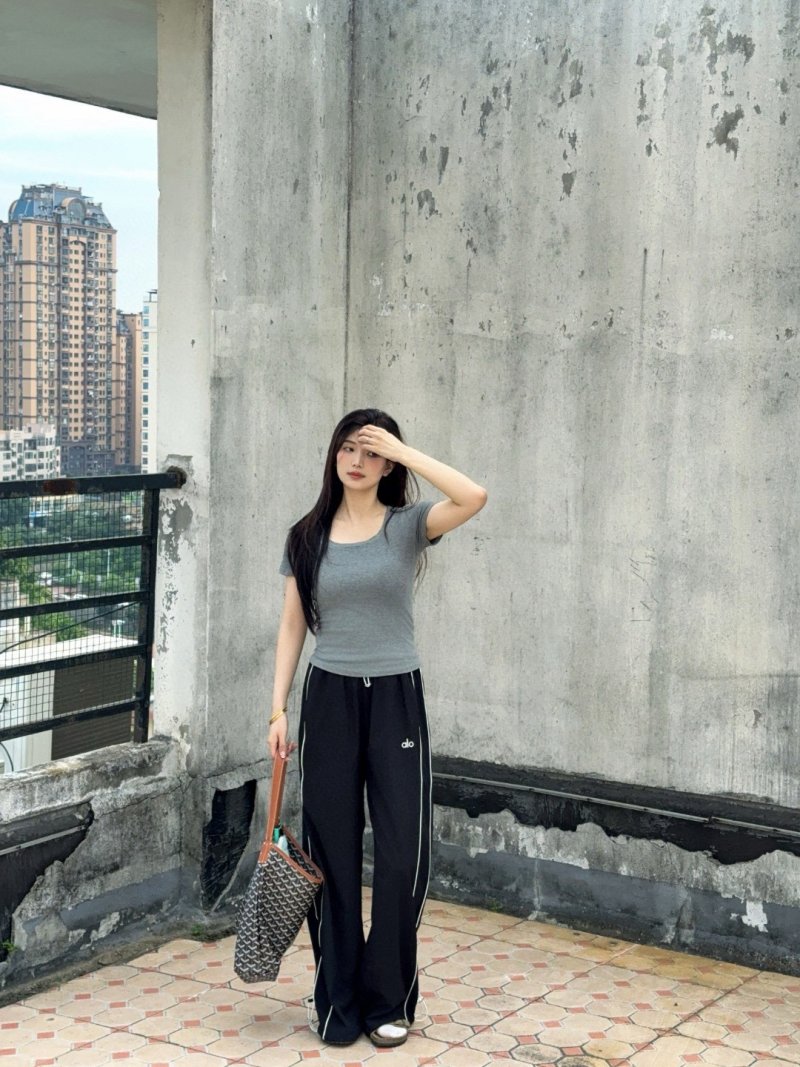 Alo Black Wide-Leg Track Pants with White Stripe view