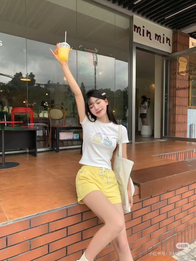 Yellow Drawstring Shorts with White Graphic Tee Set view