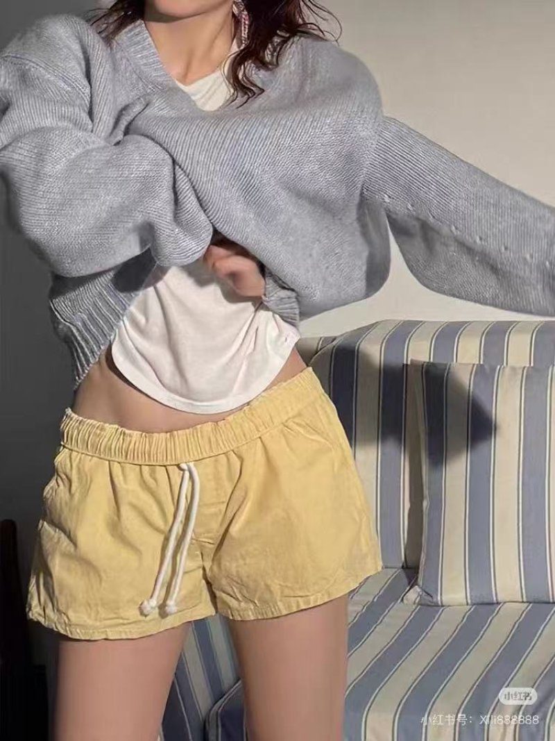 Yellow Drawstring Shorts with White Graphic Tee Set view