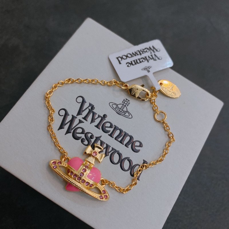 Vivienne Westwood Saturn Gold Chain Bracelet with Pink Stone